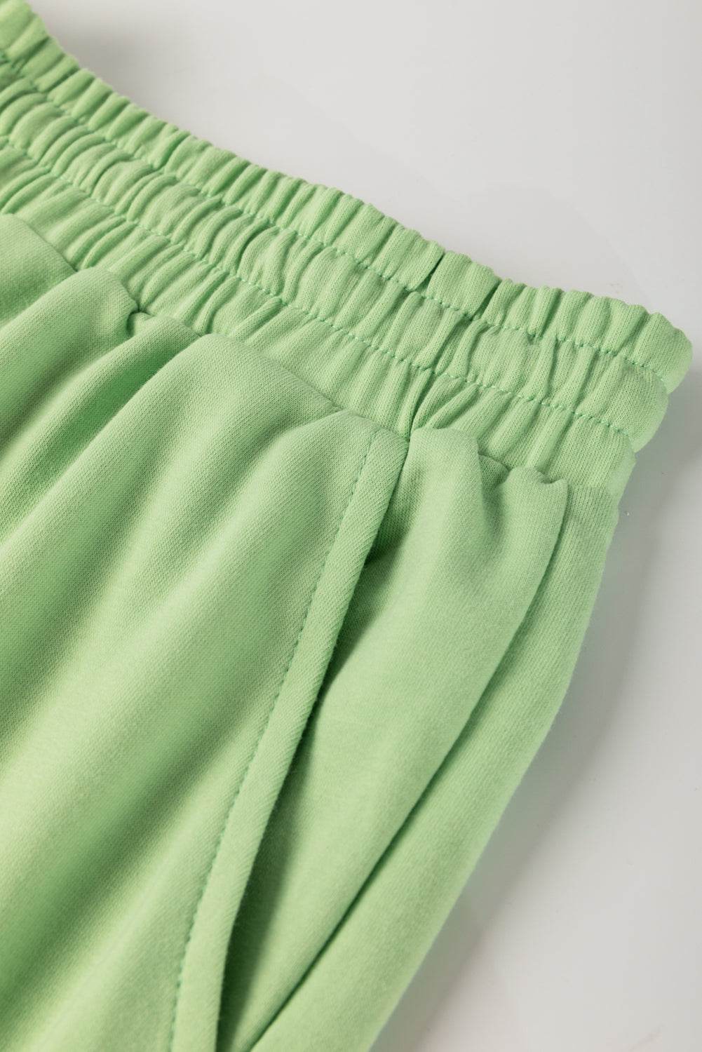 Meadow Mist Green Plus Size V Neck Drop Shoulder Tee Loose Shorts 2pcs Outfit - IntuitiveEncBoutique