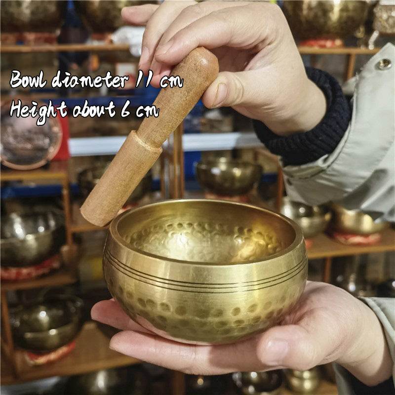 Tibetan brass singing bowl with Sanskrit – handmade meditation instrument for stress relief. - IntuitiveEncBoutique