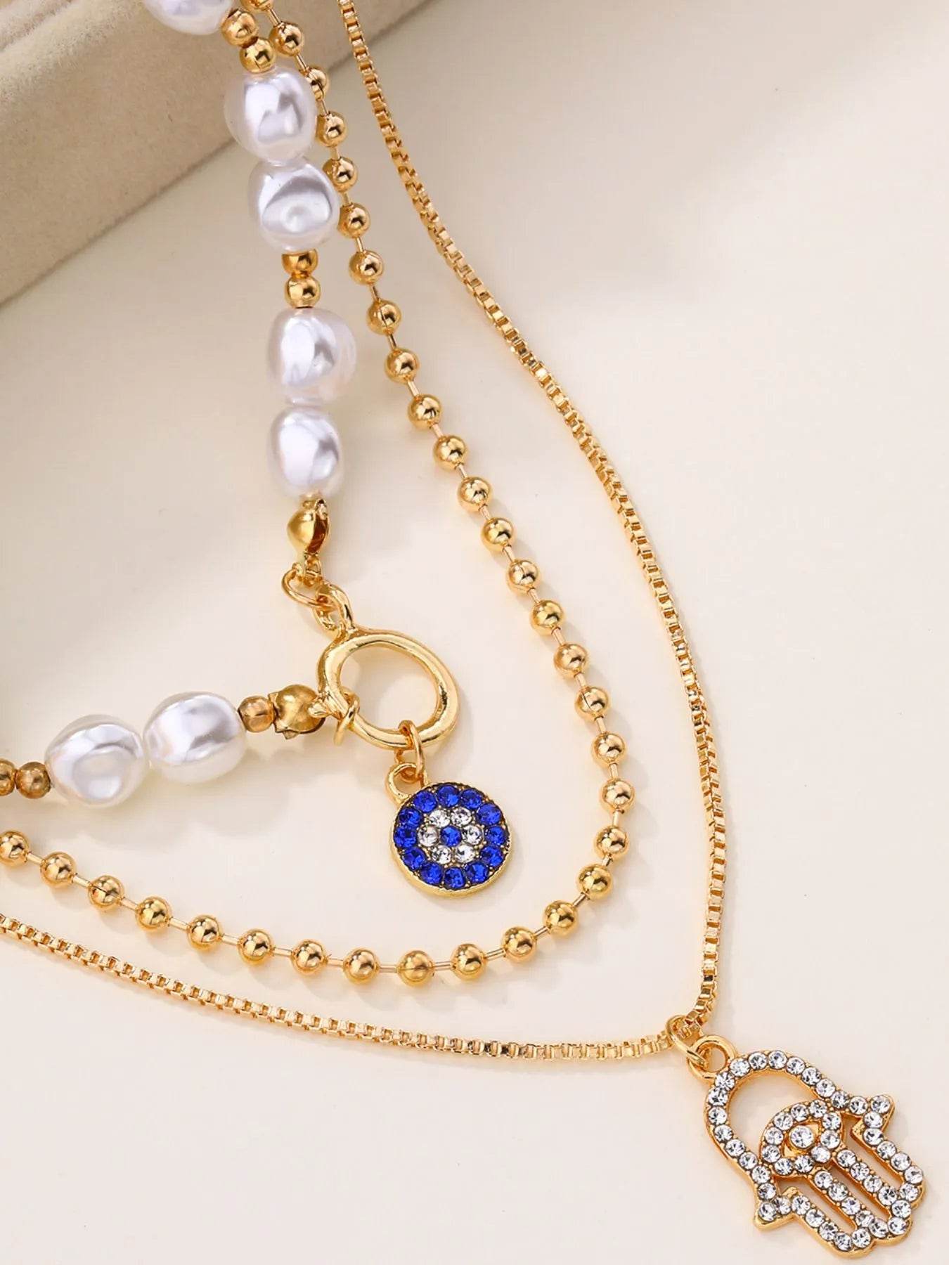 Layered Pearl Chain Evil Eye Hamsa Pendant Necklace - IntuitiveEncBoutique